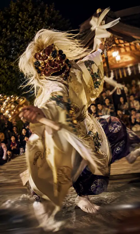 Shaking the Golden Bell and Scattering White Hair in the Demon Mask Kagura Dance